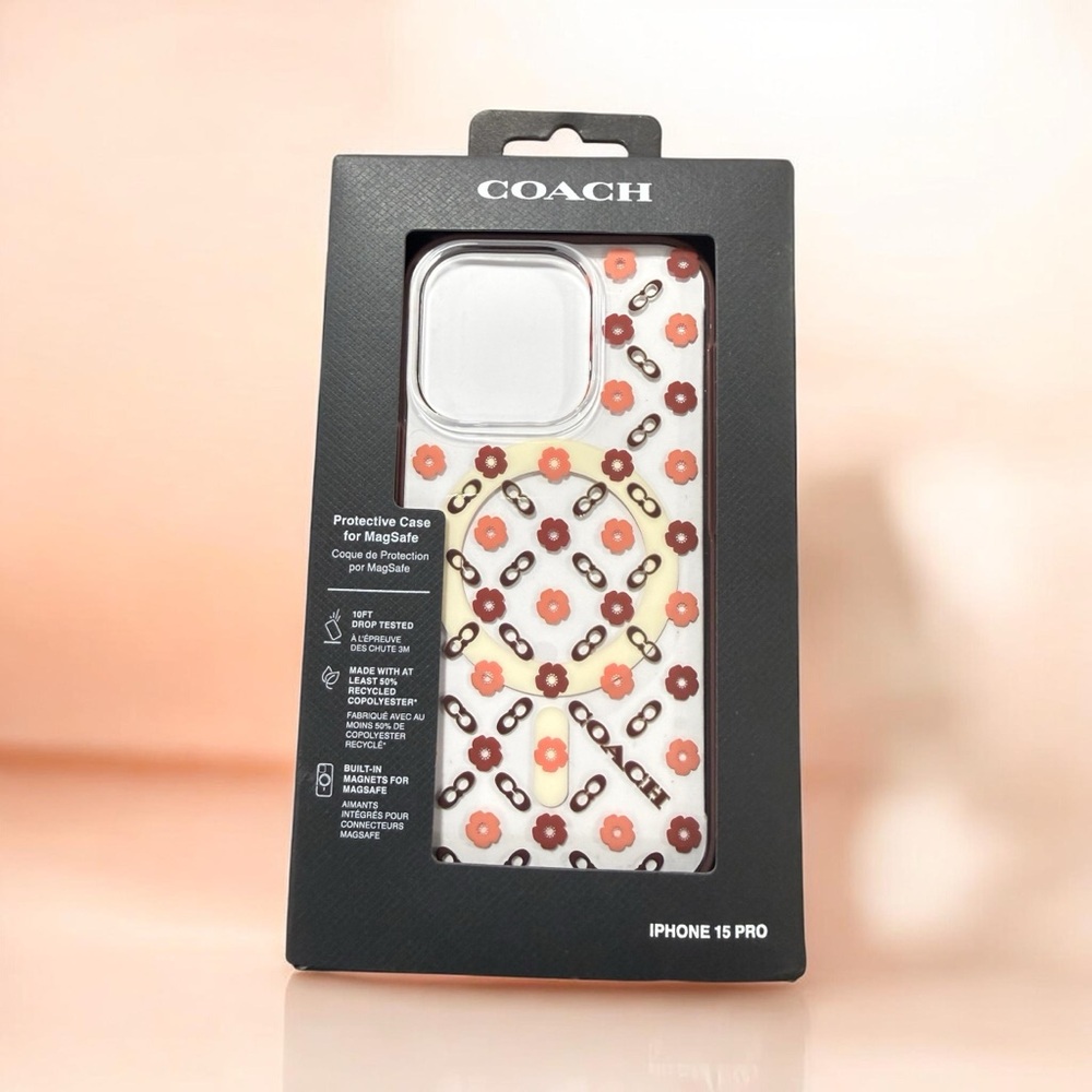 Coach White Floral Chain iPhone 15 Pro Case - Orange & Brown Flowers